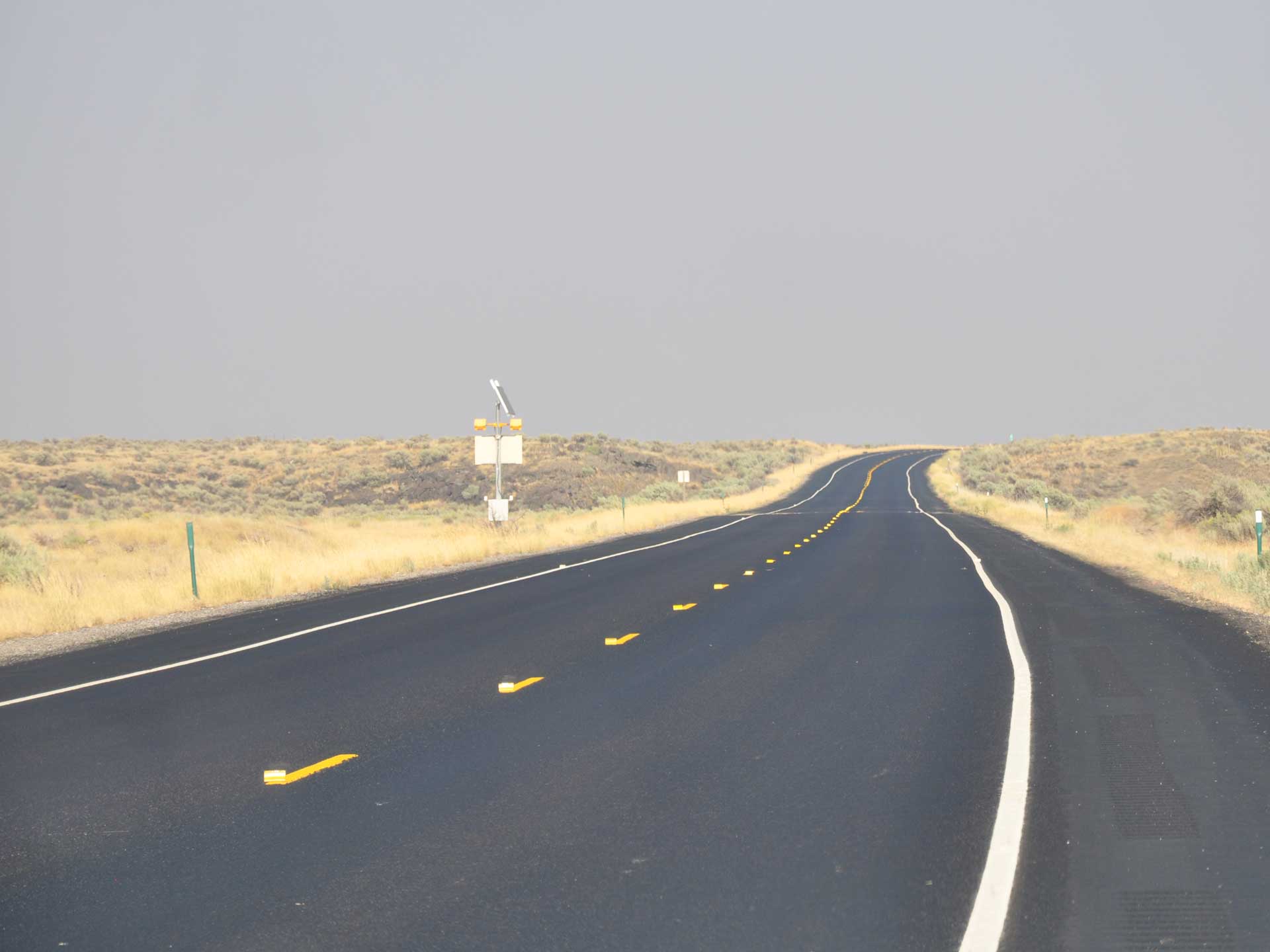 old two lane highway heading east towards Rexburg, Idaho